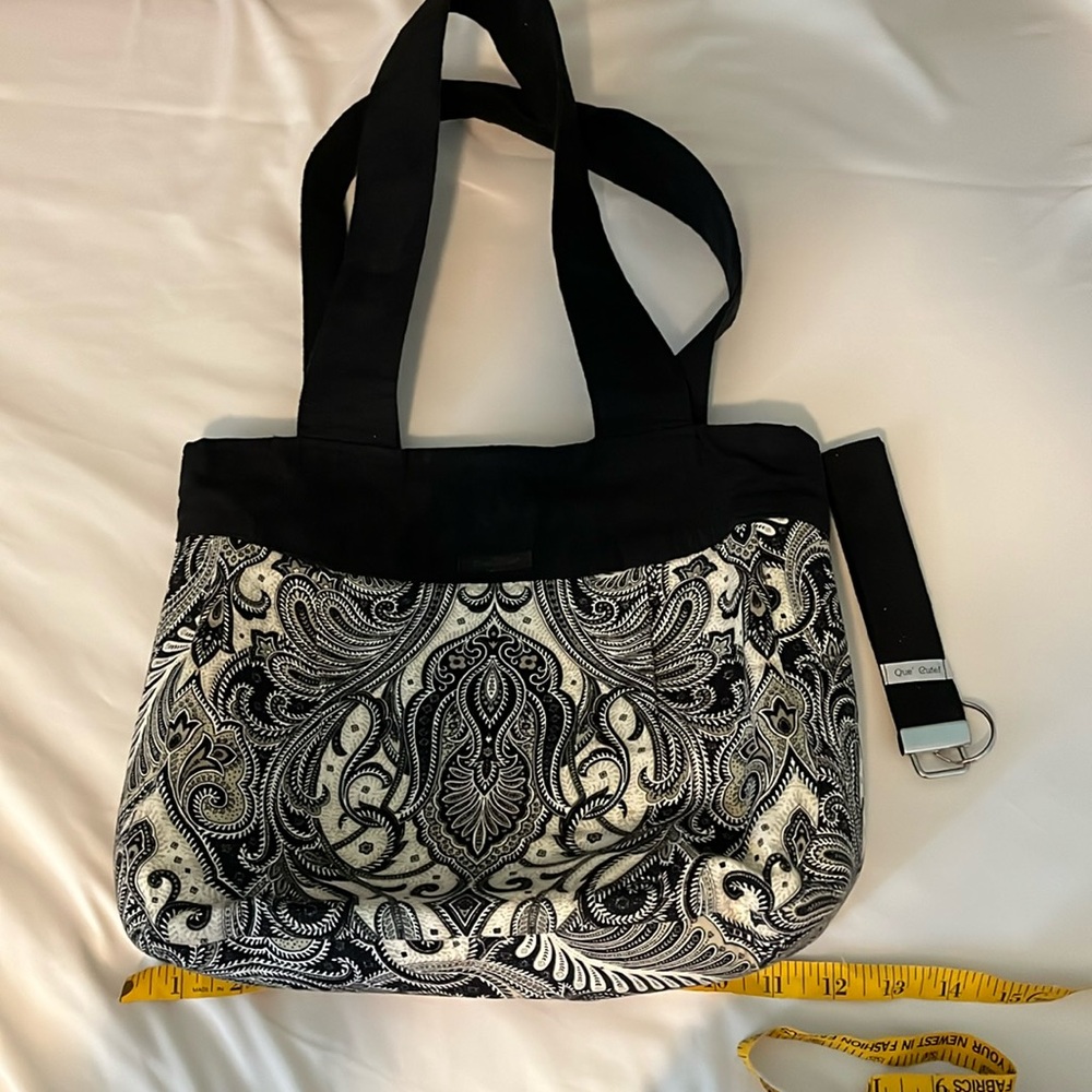 Que’ cute bag.